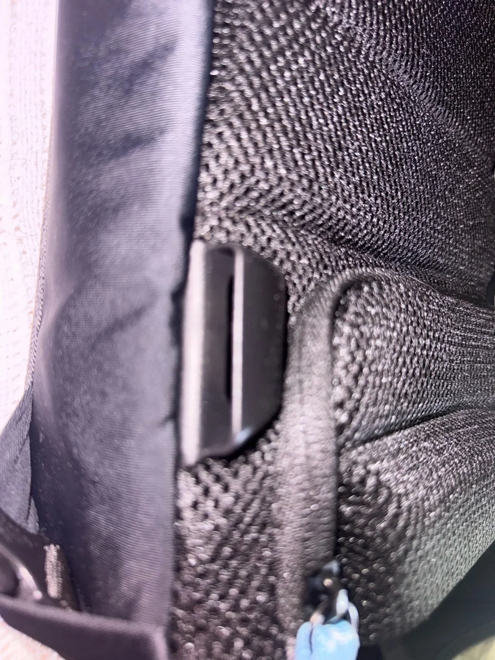 Men's Compact Black Sling Bag with Light Blue Accents